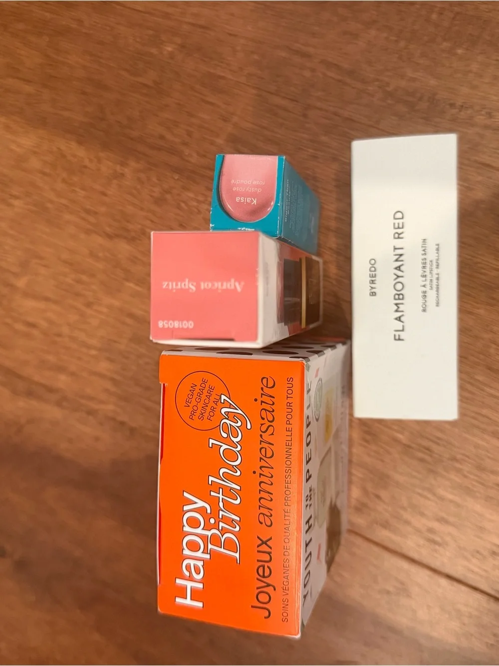 Youth to the people set, Laura Geller blush, lippy, thrive lippy, Byeredo red li